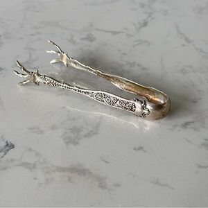 Antique sterling sugar tongs made by Whiting Manufacturing Co